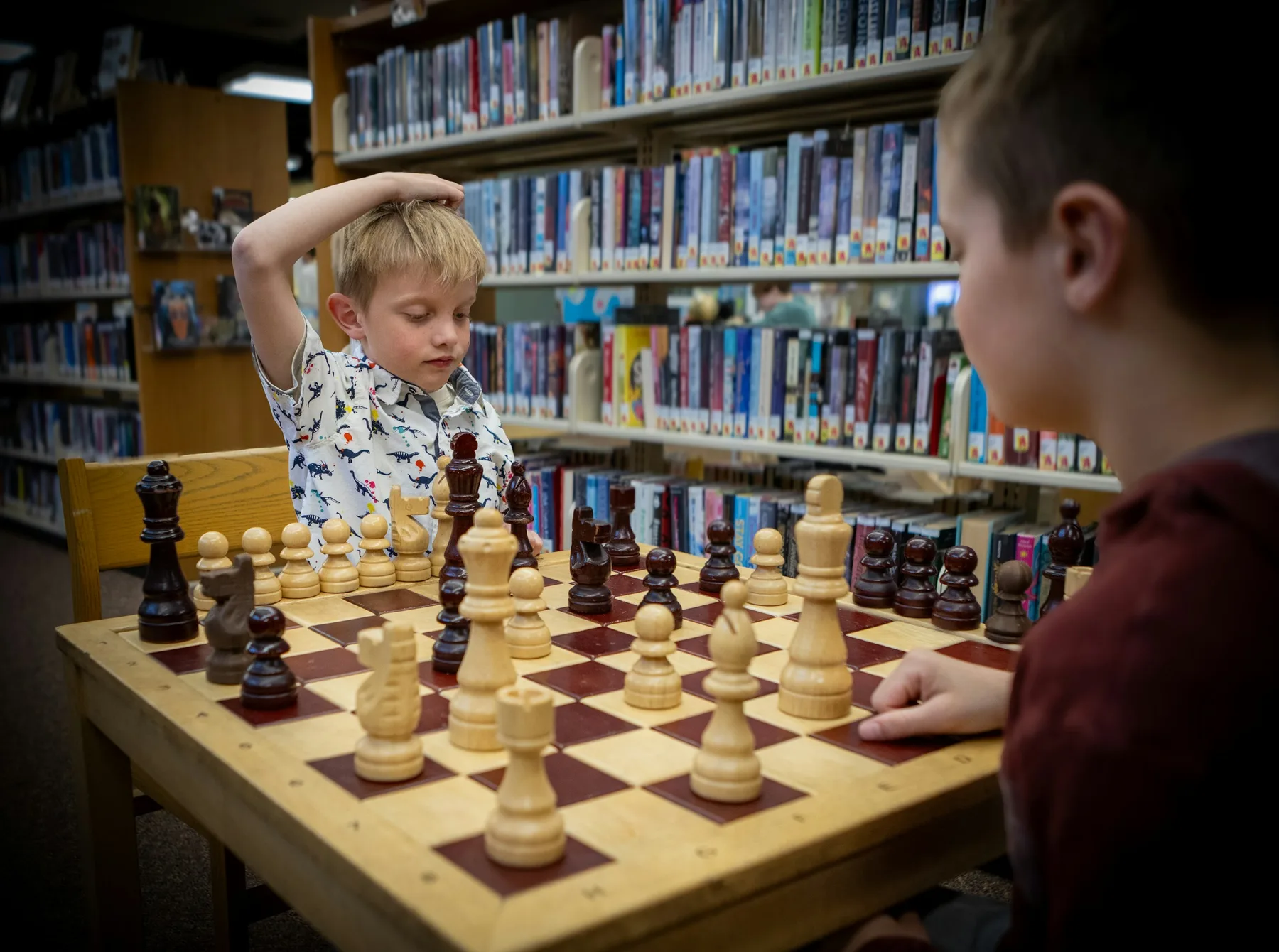 Two students concentrating during a chess game